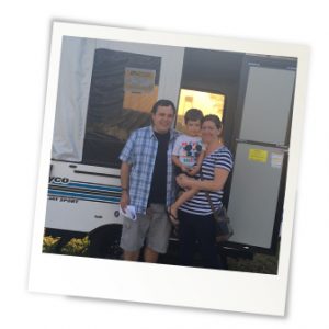 family camping in their camping trailer